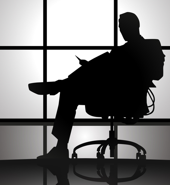 white, greyish background with a male figure infront sitting on an office chair